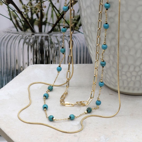 Triple layer golden mixed chain and turquoise bead necklace by Peace of Mind